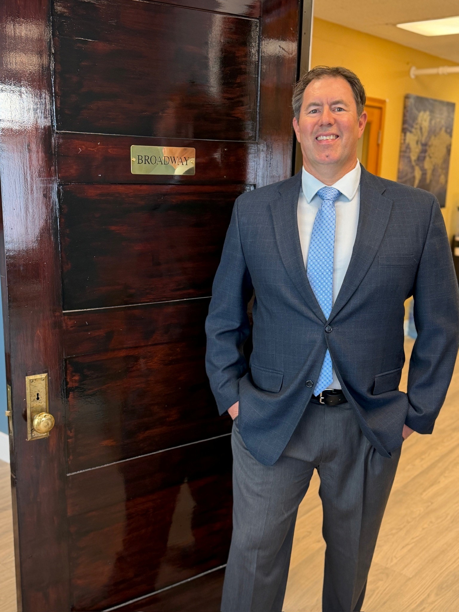Mitch Vap at the Broadway Street entrance to Vap Law PLLC — 101 East Broadway, Suite 203, Missoula, Montana